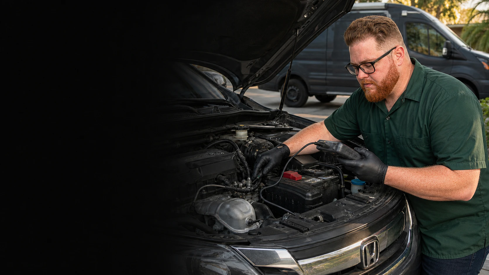 Garrett's Garage mechanic inspecting a Honda Accord engine bay